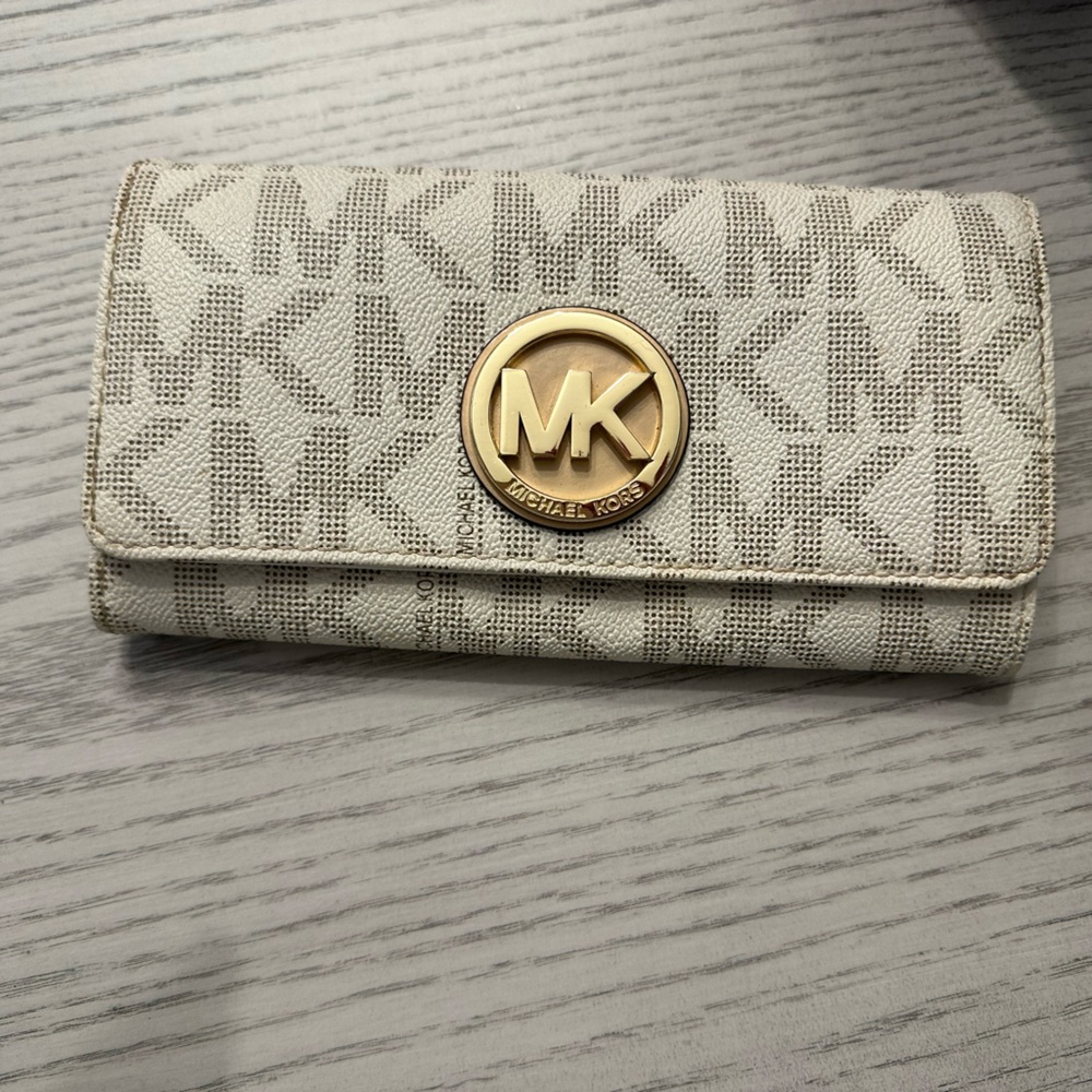 Michael Kors white long wallet.